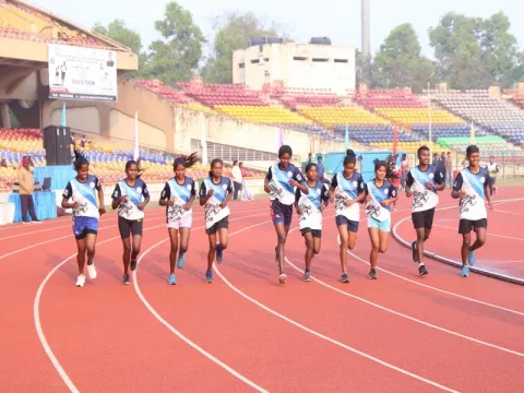 Image of Adivasi women participating in Sports.